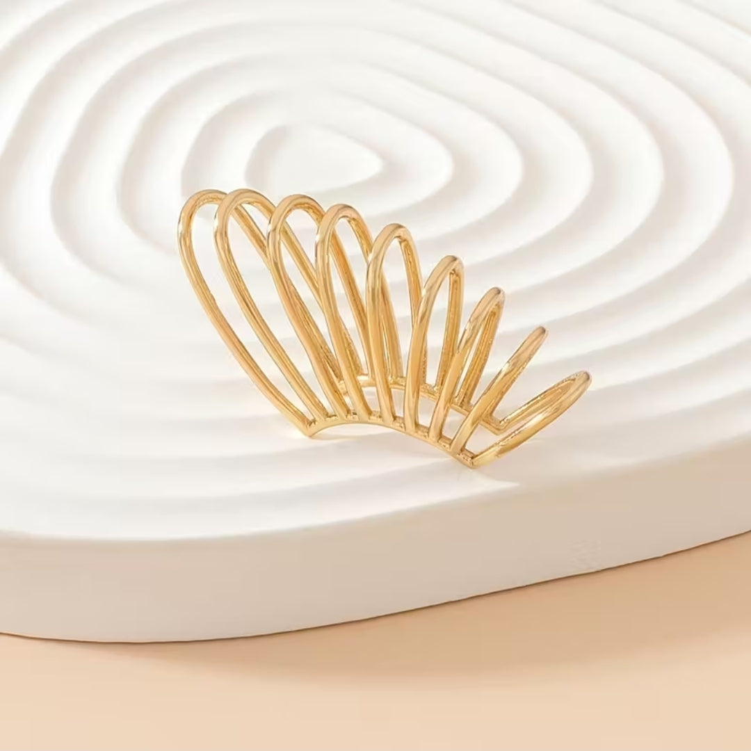 European-Style Metal Spiral Ear Cuff with Hollow Design.